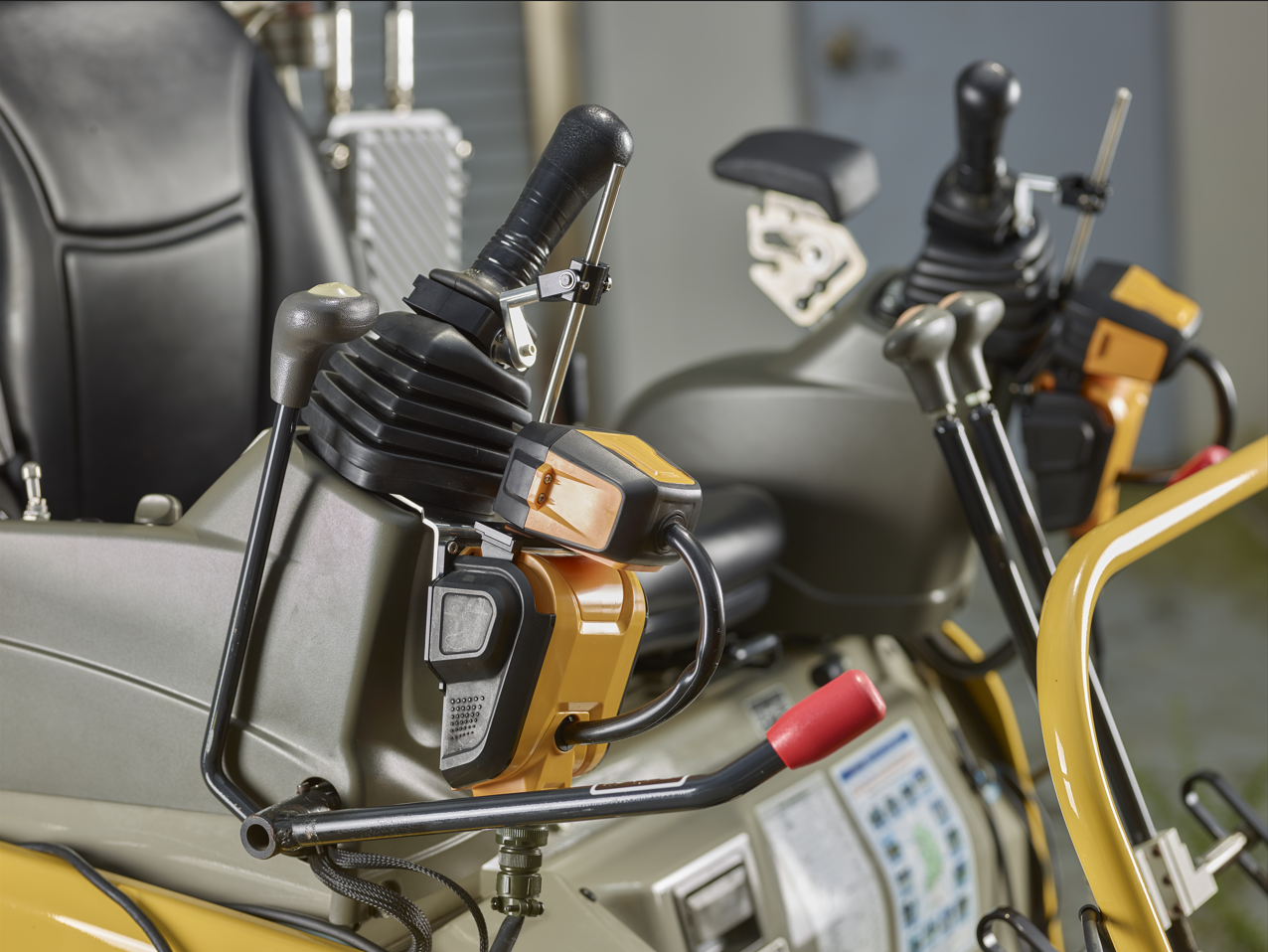 Remote Control Robot lever modules attached beside the excavator seat